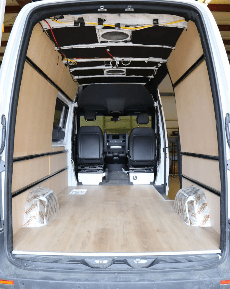 Foundation Package interior showing flooring, wall panels and insulation